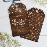 Brown Rustic Wood Mason Jars Lights Bridal Shower Gift Tags<br><div class="desc">Adorn your favor gifts with a personal touch; this rustic bridal shower gift tag features lights in mason jars and strings of lights with the word "Bridal Shower" against a brown wood pattern background. They're perfect for a rustic country bridal shower. Do take a look at the other Bridal Shower...</div>