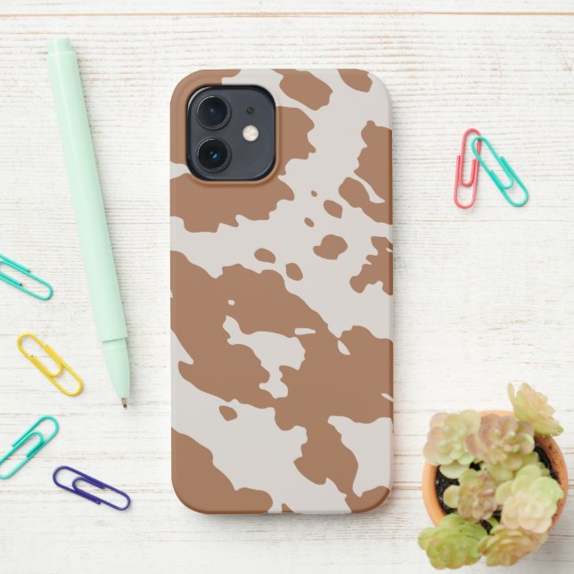 Brown Spotted Cowhide Animal Print iPhone Case (On Desk)