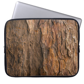 Brown tree bark in closeup photography laptop sleeve