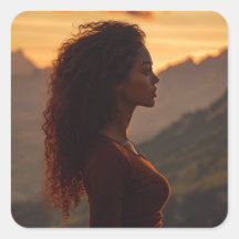 Brown woman overlooking the mountains