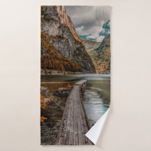 BROWN WOODEN DOCK NEAR MOUNTAIN DURING DAYTIME BATH TOWEL