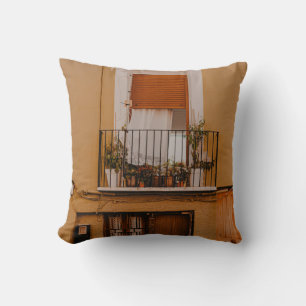 BROWN WOODEN WINDOW FRAME WITH GREEN PLANTS THROW PILLOW