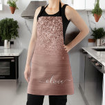 Brushed Metal Rose Gold Pink Glitter Monogram Apron<br><div class="desc">Rose Gold - Blush Pink Faux Foil Metallic Sparkle Glitter Brushed Metal Monogram Name Apron. This makes the perfect sweet 16 birthday,  wedding,  bridal shower,  anniversary,  baby shower or bachelorette party gift for someone that loves glam luxury and chic styles.</div>