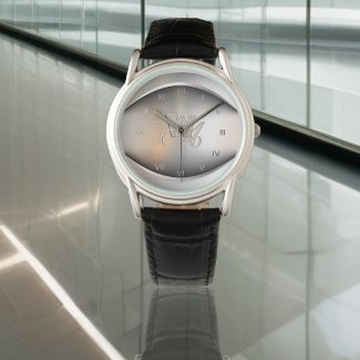 Brushed steel with engraved monogram pattern