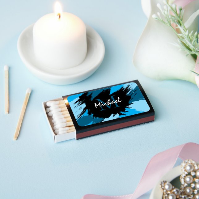 Brushstrokes shades of blue name with monogram matchboxes (Insitu)