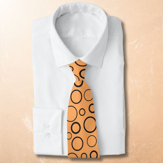 Bubbles and rings, black circles on orange neck tie