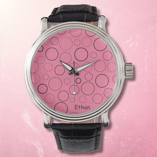 Bubbles and rings, black circles on pink watch (Creator Uploaded)