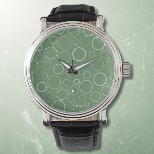 Bubbles and rings, white circles on green watch
