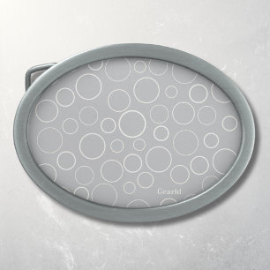 Bubbles and rings, white circles on grey belt buckle