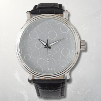Bubbles and rings, white circles on grey watch