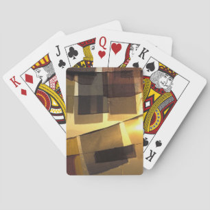 Buddhist prayer flags in the sunset, poker cards