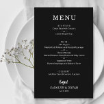 Budget Simple Elegant Black Wedding Dinner Menu<br><div class="desc">A black dinner menu card features your menu in chic white lettering. Affordable 110 lb. paper measures 5.5" x 8.5". Perfect for a modern wedding reception,  wedding rehearsal dinner,  anniversary party or any special event with a sit down dinner. MORE COLORS,  sizes and prices in our collection.</div>