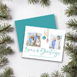 Budget Teal Seas and Greetings Shell Holiday<br><div class="desc">Budget Seas and Greetings Seashell Ornament Holiday Photo Christmas Cards featuring turquoise blue and sandy tan shell ornaments hanging from sailing jute rope with elegant typography. Add two of your photos and a personal message for a fun nautical holiday card. **Our BUDGET paper is smaller, lighter, and more delicate, but...</div>