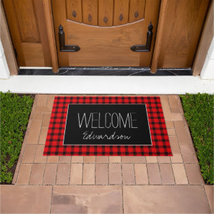 Buffalo plaid black Welcome family name script Doormat