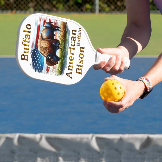 Buffalo Standing in Grass Field With American Flag Pickleball Paddle (Insitu)
