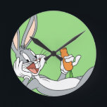 BUGS BUNNY™ Lying Down Eating Carrot Round Clock<br><div class="desc">LOONEY TUNES™ | Check out this BUGS BUNNY™ Lying Down Eating Carrot artwork! Click the customize button to begin personlizing your very own LOONEY TUNES™ merchandise!</div>