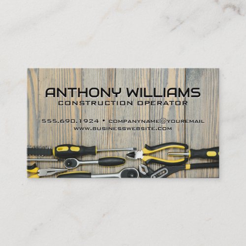 Builder Hand Tools on Wooden Table Business Card