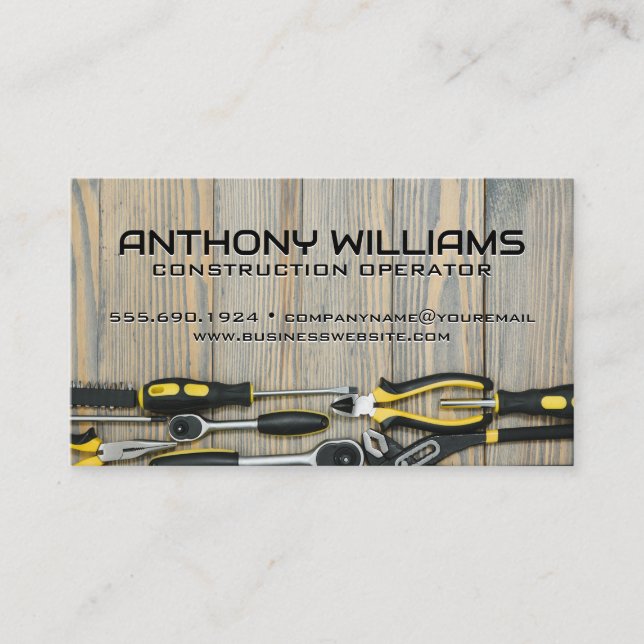 Builder Hand Tools on Wooden Table Business Card (Front)