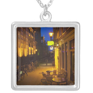 Buildings with 17th or 18th century facade and silver plated necklace