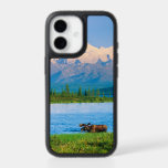Bull moose in Wonder Lake iPhone 17 Case<br><div class="desc">Wonder Lake,  Bull moose feeds on vegetation,  Alaska mountains in the distance,  Denali National Park,  Alaska</div>