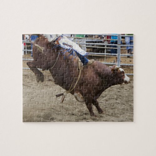 Bull rider at rodeo jigsaw puzzle