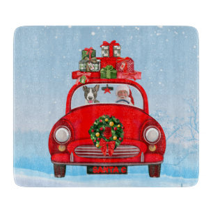 Bull Terrier Dog In Car With Santa Claus Cutting Board