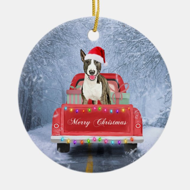Bull Terrier Dog in Snow sitting in Christmas  Ceramic Ornament (Front)