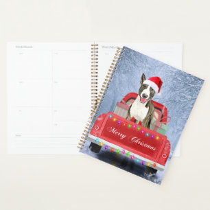 Bull Terrier Dog in Snow sitting in Christmas Planner