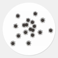 Bullet holes from a rifle or gun, possibly shotgun