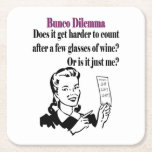 Bunco Funny Dilemma Square Paper Coaster<br><div class="desc">Fun Bunco Inspired Graphic Design. This retro design features a retro style women who is pondering: "Does It Get Harder To Count After A Few Glasses Of Wine? Or is It Just Me? Great coasters for your glasses filled with wine, sangria, margaritas, beer, water, soda, punch and more. Makes a...</div>