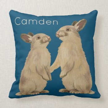 Bunnies Painted On Pillow (blue)your Child’s Name by spacetempodesign at Zazzle