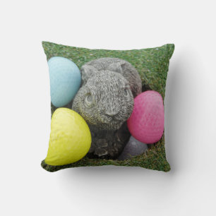 Bunny with colored golf balls throw pillow