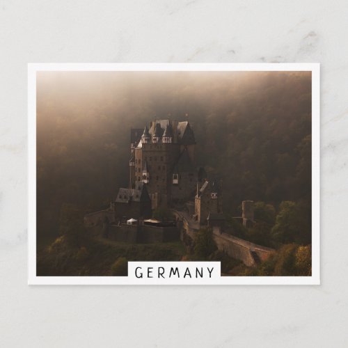 Burg Eltz castle in the morning fog Postcard