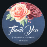 Burgundy Blush Floral Navy Wedding Thank You Classic Round Sticker<br><div class="desc">These wedding thank you stickers feature a watercolor floral design with a navy chalkboard background. Personalize these stickers with your names and wedding date. These stickers are part of a collection which includes matching wedding stationery and gifts. Please visit the collection pages in our store to see the full range...</div>