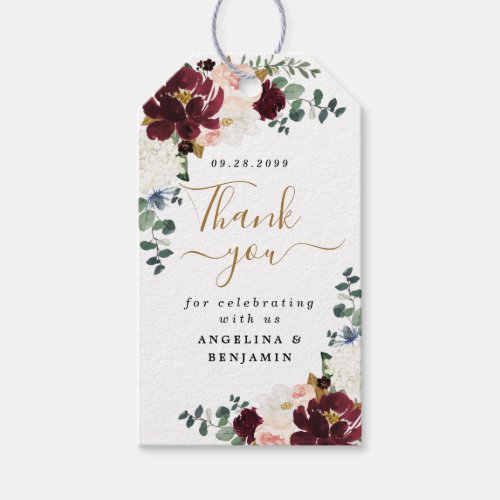 Burgundy Blush Gold Floral Thank You Favor Wedding Gift Tags - Design features peonies, magnolia, hydrangea, roses, Scottish thistle, and more in shades of burgundy, various types of red, blush pink white and navy blue (thistle). Design also features gold printed leaves and numerous types of green greenery including eucalyptus leaves or branches. The names are set to a gold colored shade to match the gold printed themed graphic elements. You can change the colors to your personal tastes.
