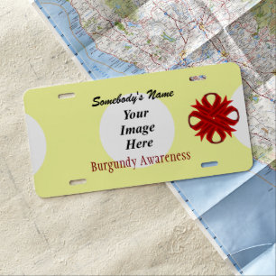 Burgundy Clover Ribbon by Kenneth Yoncich License Plate