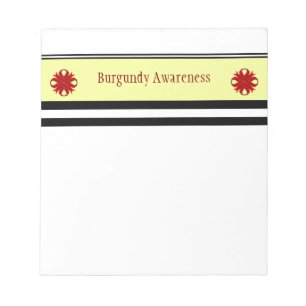 Burgundy Clover Ribbon by Kenneth Yoncich Notepad