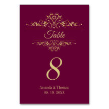 Burgundy elegant golden frame wedding table 