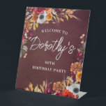 Burgundy Fall Flowers 80th Birthday Party Welcome Pedestal Sign<br><div class="desc">Beautiful fall flowers decorate two corners of this birthday party welcome sign. Red roses,  terracotta flowers and white peonies blend with deep green leaves and foliage. The flowers and white modern script pop against the burgundy red background. This item is part of the Burgundy Fall Flowers collection.</div>