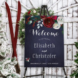 Burgundy floral winter wedding navy welcome sign<br><div class="desc">Rustic chic wedding sign foam board with red burgundy and white peonies and winter seasonal fir branches,  red berries,  and foliage and with custom script lettering on a dark midnight navy blue chalkboard background             Suitable for Christmas themed rustic floral winter weddings.</div>