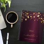 Burgundy gold stars name script glamorous 2025 planner<br><div class="desc">A dark burgundy background, decorated with faux gold dripping stars. Template for a year. Personalize and add a name and a title. The name is written with a golden modern hand lettered style script with swashes. Perfect for school, work or organizing your personal/family life. To keep the swashes only delete...</div>