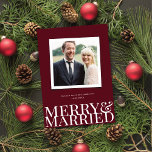 Burgundy Merry & Married Newlywed Christmas Photo Holiday Card<br><div class="desc">This modern yet elegant holiday photo card features a festive deep burgundy background and oversized text that says "merry & married". This design accommodates one square photo. The back of the card is the same burgundy color background that is on the front, which can be change if desired. You can...</div>