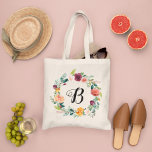 Burgundy Pink Floral Wreath Bridesmaid Initial Tote Bag<br><div class="desc">Custom wedding tote bag features a monogram initial framed by an elegant boho style floral wreath design with beautiful fall watercolor flowers, including roses, dahlias, peony flowers, and greenery, in a gorgeous autumn palette of burgundy red, golden yellow, peach orange, blush pink, and shades of green. Personalize with a first...</div>