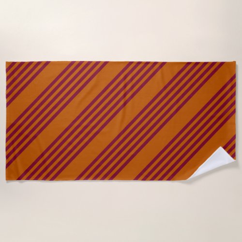 Burgundy red and burnt orange five stripe pattern beach towel