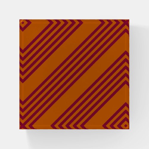 Burgundy red and burnt orange five stripe pattern paperweight