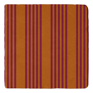 Burgundy red and burnt orange five stripe pattern. trivet