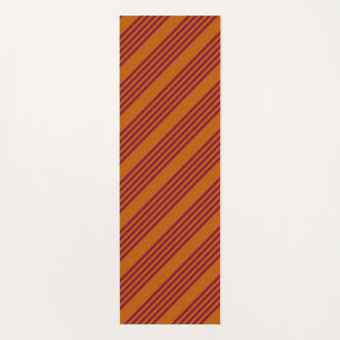 Burgundy red and burnt orange five stripe pattern. yoga mat