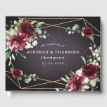 Burgundy Red Black and Gold Floral Elegant Wedding Guest Book<br><div class="desc">Design features a black chalkboard printed texture for the background with a printed gold colored geometric frame that’s covered in unique elegant greenery that consists of eucalyptus and other leaves/branch elements. Design also features burgundy red rose and peony flowers and other blush pink floral elements for added unique décor.</div>