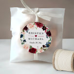 Burgundy Red Blush Floral Wreath Wedding Favor Classic Round Sticker<br><div class="desc">Make your wedding favors stand out with this Burgundy Red Blush Floral Wreath Sticker. Featuring a chic and trendy floral wreath design in shades of burgundy, blush, and greenery, this round sticker is perfect for adding a pop of color and style to your wedding favors. You can customize the sticker...</div>