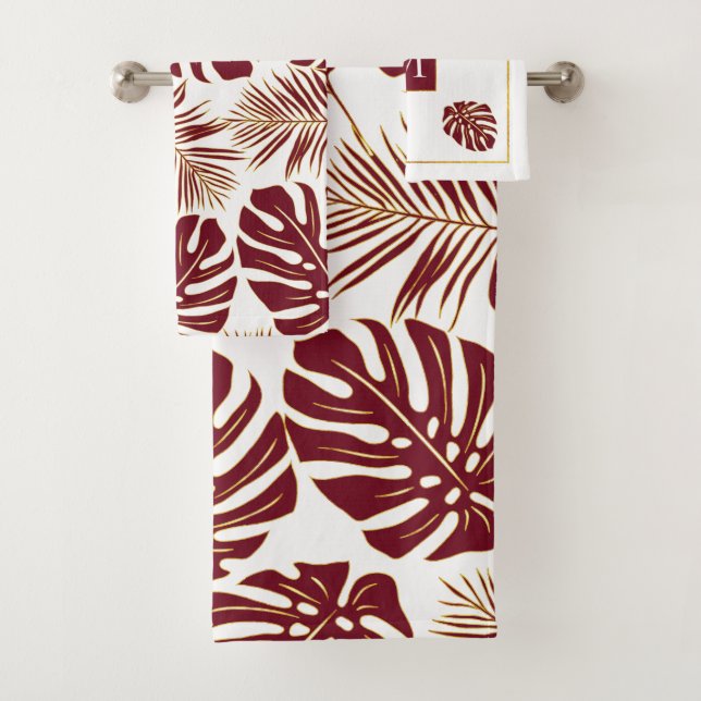 Burgundy red tropical leaves and monogram bath towel set (Insitu)